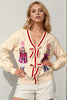 Double Take Full Size Nutcracker Sequin Bow Decor Cardigan
